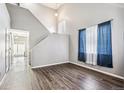 Spacious living room with hardwood floors and high ceilings at 20493 E Hampden Pl, Aurora, CO 80013