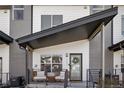 Cozy front porch with seating area, perfect for enjoying the outdoors and welcoming guests at 5880 W 39Th Pl, Wheat Ridge, CO 80212