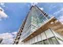 Modern high-rise building featuring glass facade and contemporary architecture at 891 14Th St # 2002, Denver, CO 80202