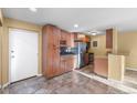 Kitchen with stainless steel appliances and wood cabinets at 1150 Golden Cir # 201, Golden, CO 80401