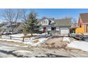 Nice curb appeal, two-car garage, and spacious driveway at 639 Quartz Way, Broomfield, CO 80020