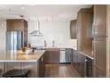 Modern kitchen with stainless steel appliances, subway tile backsplash, and spacious countertops at 3100 E Cherry Creek South Dr # 1403, Denver, CO 80209