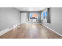 Bright living room with hardwood floors and lots of natural light at 537 S 2Nd Ave, Brighton, CO 80601