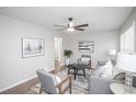 Cozy living room featuring a gray sofa, armchairs, and a coffee table at 1716 Moline St, Aurora, CO 80010