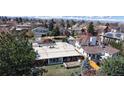 Spacious backyard with a deck, patio, and a view of the surrounding neighborhood at 110 Forest St, Denver, CO 80220