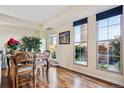 Charming dining room with hardwood floors and access to a patio at 300 W 11Th Ave # 18C, Denver, CO 80204