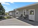 Relaxing deck area with comfortable seating, perfect for enjoying the outdoors at 3596 Longs Peak Cir, Parker, CO 80138