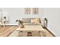 Cozy living room showcasing neutral tones, stylish decor, and comfortable seating arrangements at 1629 N Clarkson St # 23, Denver, CO 80218