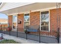 Inviting front porch with a bench, perfect for relaxing at 10502 Washington Way, Northglenn, CO 80233