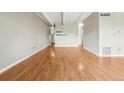 Expansive living area with hardwood floors, offering versatility for various furniture arrangements and design styles at 1441 N Humboldt St # 204, Denver, CO 80218