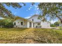 Expansive backyard with a picnic table and lush landscaping at 6668 Walker Ct, Niwot, CO 80503