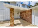 Charming home entrance with stone accents and a welcoming wreath on the front door at 6668 Walker Ct, Niwot, CO 80503