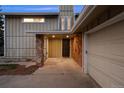 Inviting entryway showcasing stone accents and a covered porch, offering a warm welcome at 6668 Walker Ct, Niwot, CO 80503