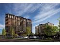 Luxury high-rise building with ample parking and beautiful landscaping at 7600 Landmark Way # 914, Englewood, CO 80111