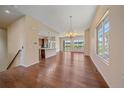 Open floor plan featuring hardwood floors, great natural light, and an open kitchen concept at 1130 Summit View Dr, Louisville, CO 80027