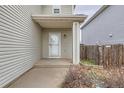 Welcoming front entrance with a covered porch and neutral siding, perfect for easy access at 20785 E 39Th Ave, Denver, CO 80249