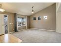 Bright living room with hardwood floors and a high ceiling at 3008 Mountain Sky Dr, Castle Rock, CO 80104