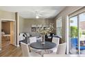 Bright living room with modern decor and dining area at 12914 Ironstone Way # 102, Parker, CO 80134