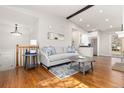 Inviting living room featuring hardwood floors and an open floor plan at 3971 S Quintero Way, Aurora, CO 80013