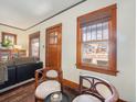 Entryway with hardwood floors and vintage wooden doors at 3412 Zuni St, Denver, CO 80211