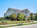 Attractive two-story home boasts a well-maintained yard, tasteful landscaping, and beautiful stone accents at 1291 Fountain Ln, Erie, CO 80516