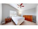 Bright bedroom with vaulted ceiling and warm, natural light at 18274 W 58Th Pl # 37, Golden, CO 80403