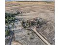 Expansive aerial view of a rural property featuring a home and lots of open land at 754 Highway 86 Hwy, Elizabeth, CO 80107