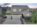 Beautiful two-story home featuring a three-car garage and charming stone accents, set in a desirable neighborhood at 6630 S Coolidge Ct, Aurora, CO 80016