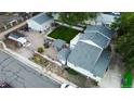 Aerial view of the home showcasing the backyard, detached garage and privacy fence at 195 Briggs St, Erie, CO 80516