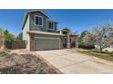Lovely two-story home with a two car garage and a beautifully landscaped front yard at 21684 Swale Ave, Parker, CO 80138