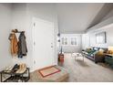 Inviting living room with neutral carpet and gray walls that highlight the open floorplan at 12555 E Tennessee Cir # 302, Aurora, CO 80012