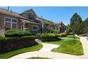 Charming townhomes feature well-maintained landscaping and inviting walkways in a serene community at 10129 Grove Ct # B, Westminster, CO 80031