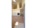 Spacious living room with a fireplace and an open floor plan at 10129 Grove Ct # B, Westminster, CO 80031