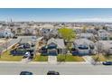 Suburban neighborhood aerial showcasing the home's location amidst well-spaced houses and greenery at 3788 Chavez St, Brighton, CO 80601