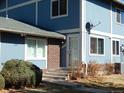 Close up of the entrance of the townhouse highlighting the address and front door at 1255 S Wheeling Way, Aurora, CO 80012