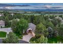 Secluded home with mature trees and mountain views at 3201 Country Club Pkwy, Castle Rock, CO 80108