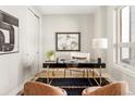 Chic office space featuring sleek black desk with gold accents and stylish decor at 8240 E 36Th Ave # 33, Denver, CO 80238