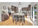 Modern kitchen with center island, stainless steel appliances, and lots of counter space at 3790 E Geddes Ave, Centennial, CO 80122