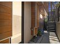 Modern entryway showing the house number, a landscaped garden area, and steps leading to the upper level at 3615 Navajo St, Denver, CO 80211