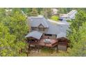 Inviting rear deck perfect for entertaining and enjoying outdoor living at 2023 Mammoth Ct, Evergreen, CO 80439