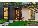Stylish front porch with modern chair and architectural details, showcasing the home's contemporary design at 1601 S Columbine St, Denver, CO 80210