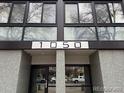 Apartment building featuring the address number and large glass windows for abundant natural light at 1050 N Corona St # 316, Denver, CO 80218