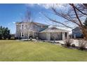 Charming two-story home with a well-manicured lawn and mature trees at 14712 Kalamath Ct, Westminster, CO 80023