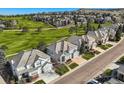 Stunning aerial view of a residential neighborhood with well-maintained homes and green spaces at 10040 Longview Dr, Lone Tree, CO 80124