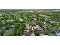 Neighborhood aerial view showing location of this home surrounded by mature trees in a quiet area at 7444 E 9Th Ave, Denver, CO 80230