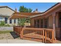 Charming deck with awning, ideal for relaxing or entertaining outdoors at 215 Sunland St, Louisville, CO 80027
