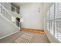 Spacious living room with hardwood floors and high ceilings at 3587 Vestal Loop, Broomfield, CO 80023