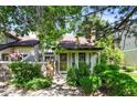View of the exterior showcasing the entrance and well-manicured greenery at 943 S Fairplay St, Aurora, CO 80012