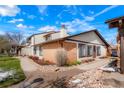 Beautiful home with brick accents, manicured yard and inviting walkway at 16035 E Ithaca Pl # D, Aurora, CO 80013