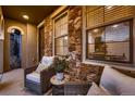 Cozy front porch with comfortable seating and stylish decor at 2618 S Kilmer Ct, Denver, CO 80228